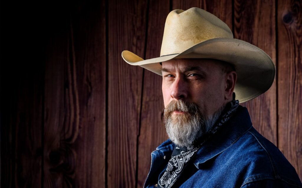 Rancher wearing a western work hat